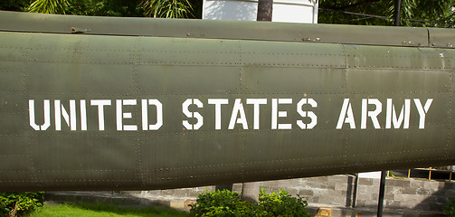 Image showing Text on an old Vietnam war Airplane displayed in Saigon