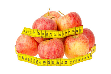 Image showing Red apples with a yellow tape-measure