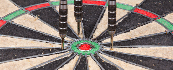 Image showing Close-up of a very old dartboard