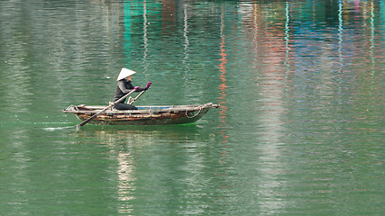 Image showing HA LONG BAY, VIETNAM AUG 10, 2012 - Food seller in boat. Many Vi