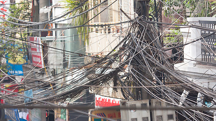 Image showing A tangle of cables and wires