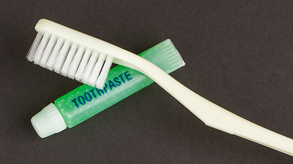 Image showing Toothbrush and green toothpaste isolated