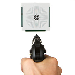 Image showing Handgun aimed on a shooting target 