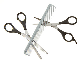 Image showing Hair cutting shears and comb