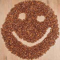 Image showing Coffee grains arranged in smiley