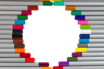 Image showing Many different color pencils, circle