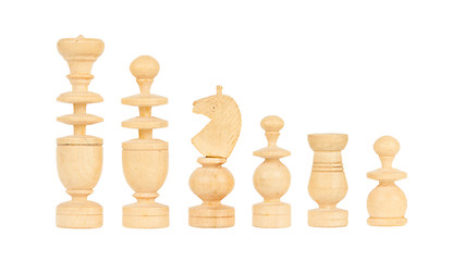 Image showing Set of old handcarved chess pieces isolated