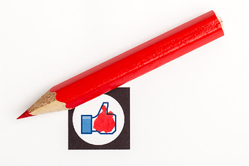 Image showing Red pencil choosing the right mood, like or unlike/dislike 