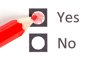 Image showing Red pencil choosing between yes or no