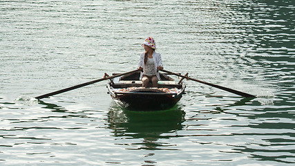 Image showing HA LONG BAY, VIETNAM AUG 10, 2012 - Food seller in boat. Many Vi