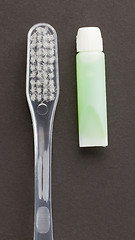 Image showing Toothbrush and green toothpaste isolated