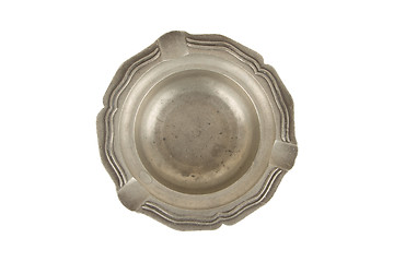 Image showing Very old tin ashtray isolated