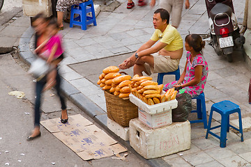 Image showing HANOI, VIETNAM, 8 AUGUST 2012; Vietnamese street vendor selling 