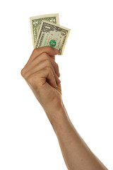 Image showing Man holding a one dollar bill in his hand