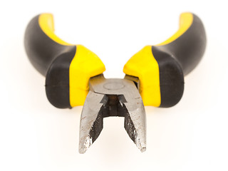 Image showing Used yellow tool pliers isolated, rust and dust 