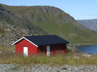 Image showing Small red house in mountains
