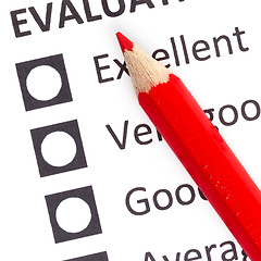 Image showing Red pencil on a evaluationform