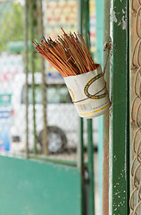 Image showing Incence sticks in an cut beer can