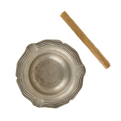 Image showing Unused large cigar with an old tin ashtray