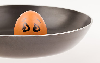 Image showing Scared egg, waiting to be fried in a pan