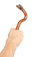 Image showing Hand holding old red crowbar