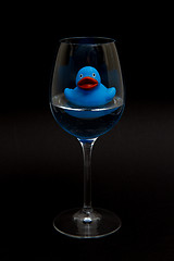 Image showing Blue rubber duck in a wineglass