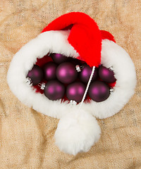 Image showing Santas hat filled with Christmas balls