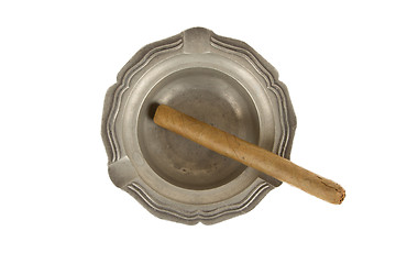 Image showing Unused large cigar in an old tin ashtray