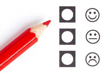 Image showing Red pencil choosing the right smiley