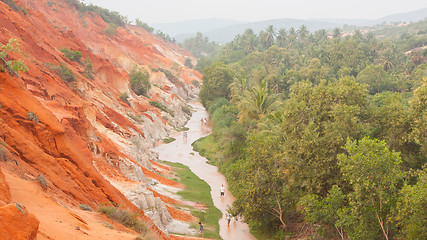 Image showing Unidentified people walking through the Ham Tien canyon in Vietn