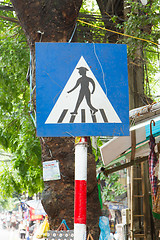 Image showing Pedestrian crossing sign in the center of Hanoi