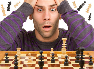 Image showing Chessboard with desperate man thinking about chess strategy, iso