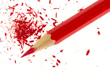 Image showing Red pencil and wood shavings