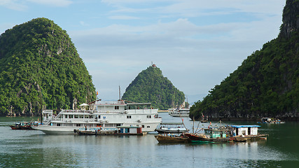 Image showing HA LONG BAY, VIETNAM AUG 10, 2012. Tourist Boats in Ha Long Bay.