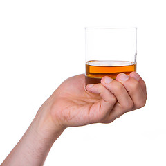 Image showing Glass of whisky in hand