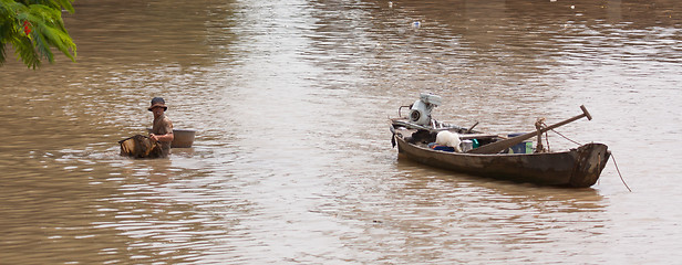 Image showing HO CHI MINH CITY, VIETNAM, 23 JULY 2012; A vietnamese fisherman 