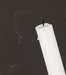 Image showing Extinguished candle with smoke