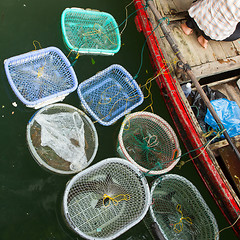 Image showing HA LONG BAY, VIETNAM AUG 10, 2012 - Food seller in boat. Many Vi