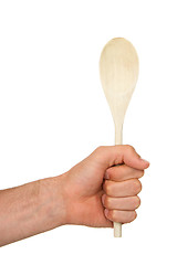 Image showing Man holding a wooden spoon