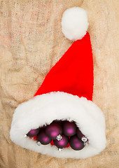 Image showing Santas hat filled with Christmas balls