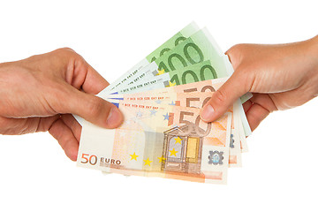 Image showing Man giving 450 euro to a woman