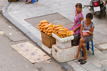 Image showing HANOI, VIETNAM, 8 AUGUST 2012; Vietnamese street vendor selling 