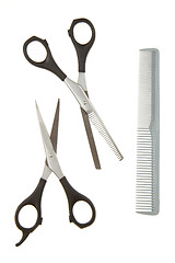 Image showing Hair cutting shears and comb