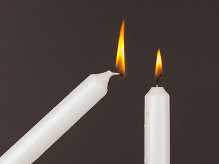 Image showing Burning white candle, isolated