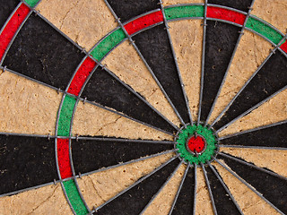 Image showing Close-up of a very old dartboard