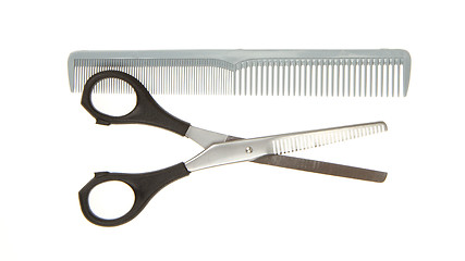 Image showing Hair cutting shears and comb