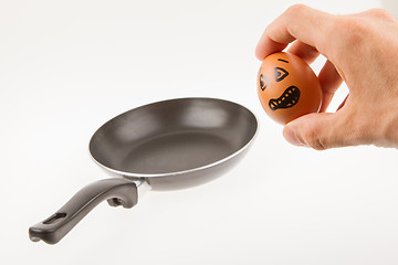 Image showing Scared egg, waiting to be fried in a pan