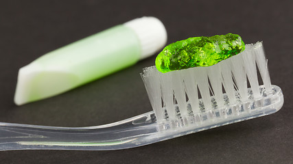 Image showing Toothbrush and green toothpaste isolated