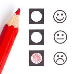 Image showing Red pencil choosing the right smiley