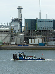 Image showing Pushing boat sailing in the port of Rotterdam (Holland)